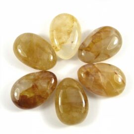 Golden Healer Trommelstein gebohrt